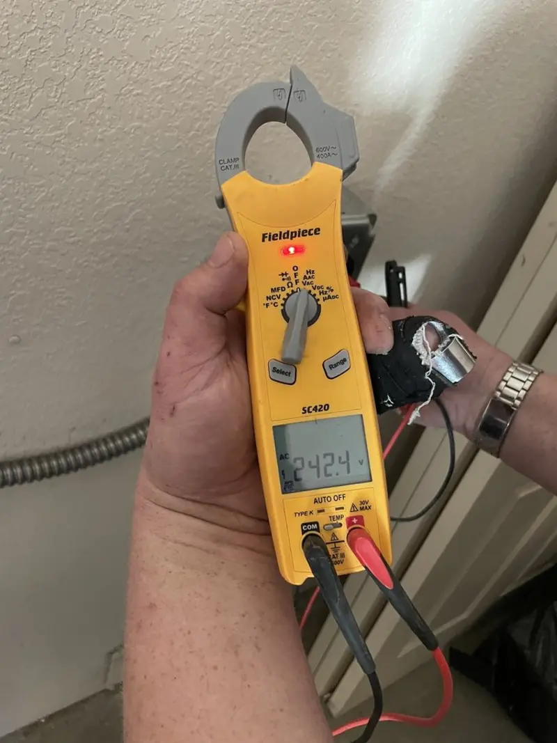 Voltage testing with clamp meter during Generator Installation in Sanford